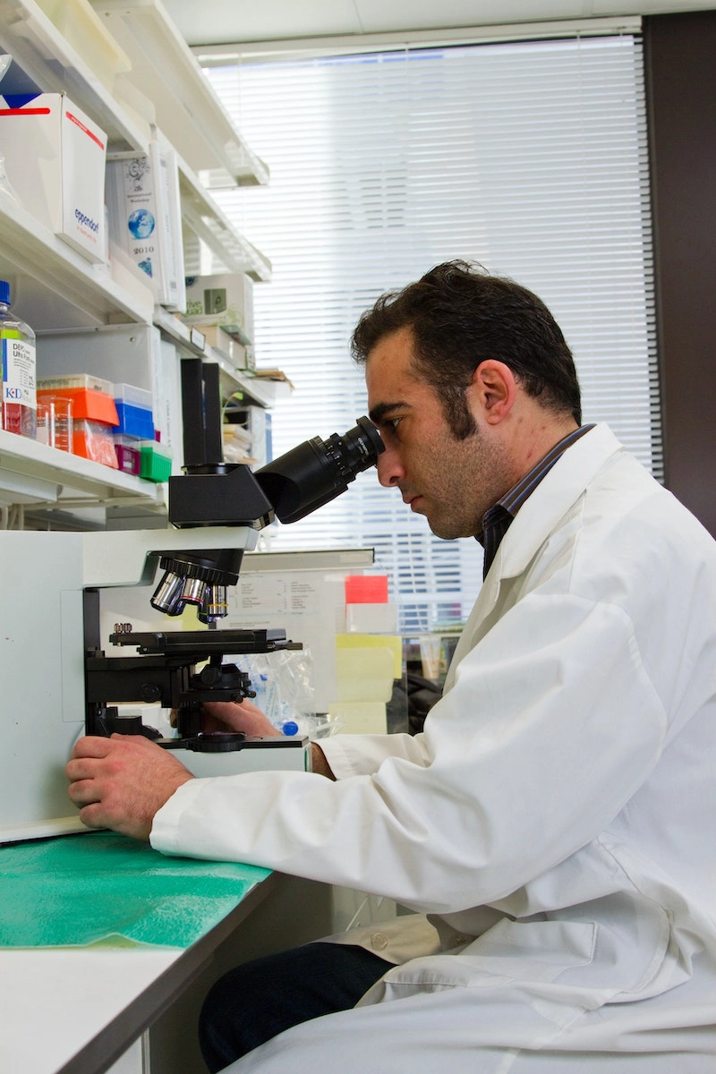 a scientist performing experiments in a lab