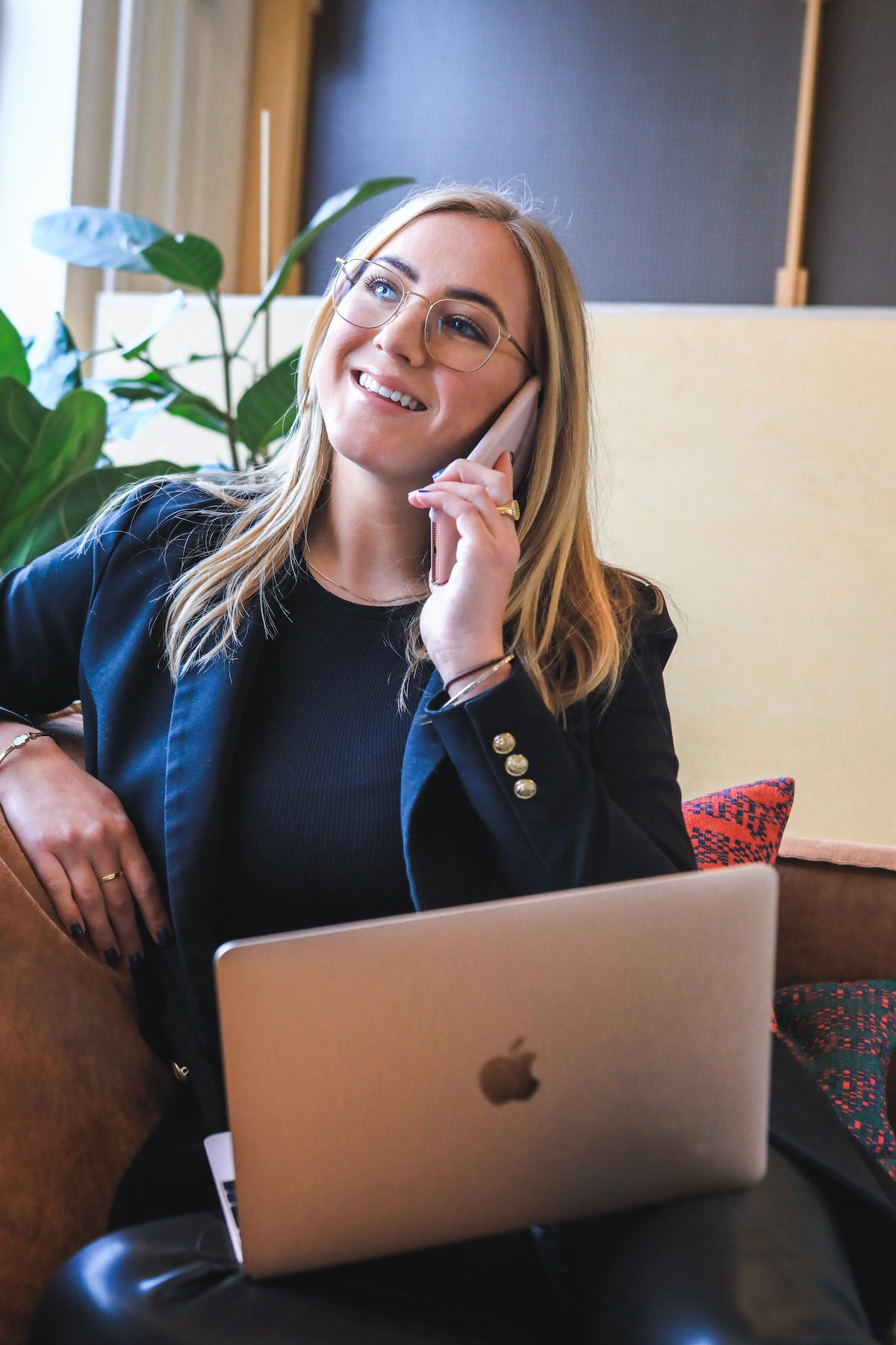 a woman on the phone, presumably discussing vision insurance