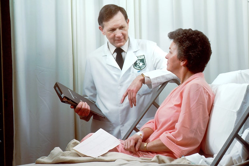 a doctor speaking to their patient